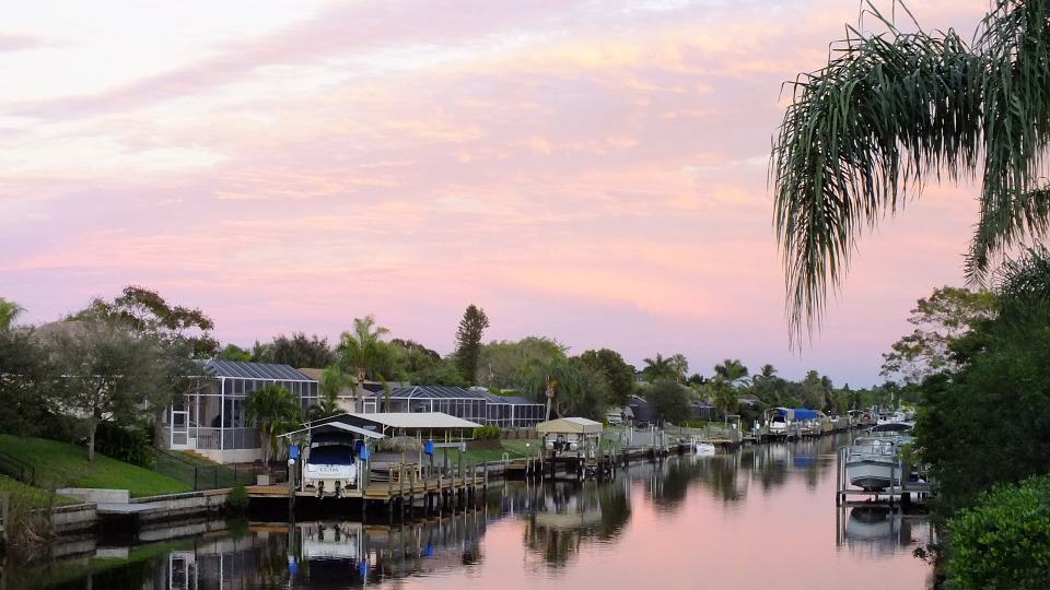 homes and boats on a cape coral canal